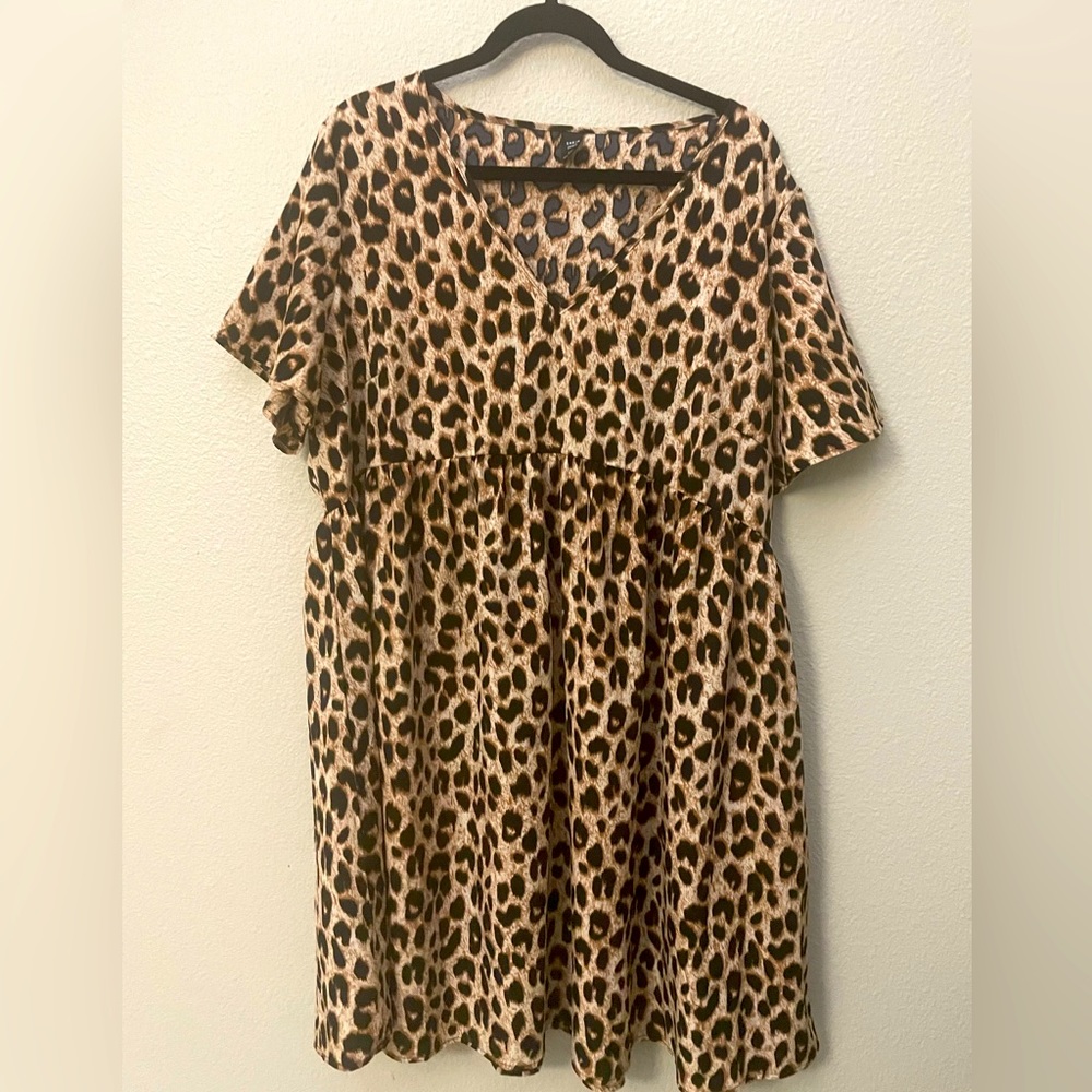 Plus size animal print cheetah print short sleeve dress.